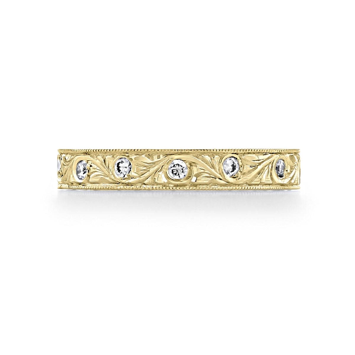 Florencia 3.2mm Engraved Pavé-Set Diamond Wedding Band in 18k yellow gold featuring engraved scrollwork and a series of burnish-set round diamonds.