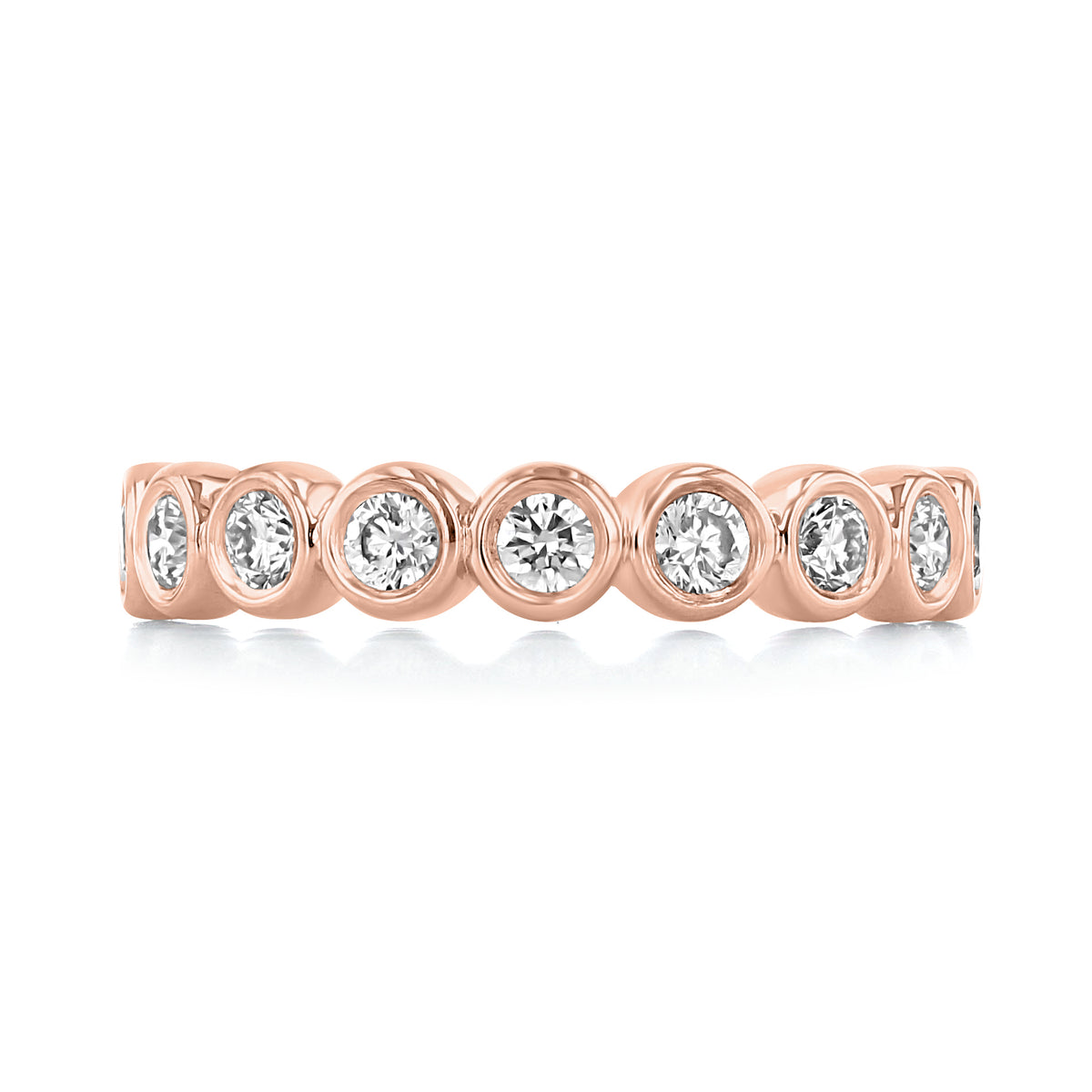Bristol | Bezel-Set Diamond Wedding Band in 14k rose gold, featuring a row of round diamonds in bezel settings.