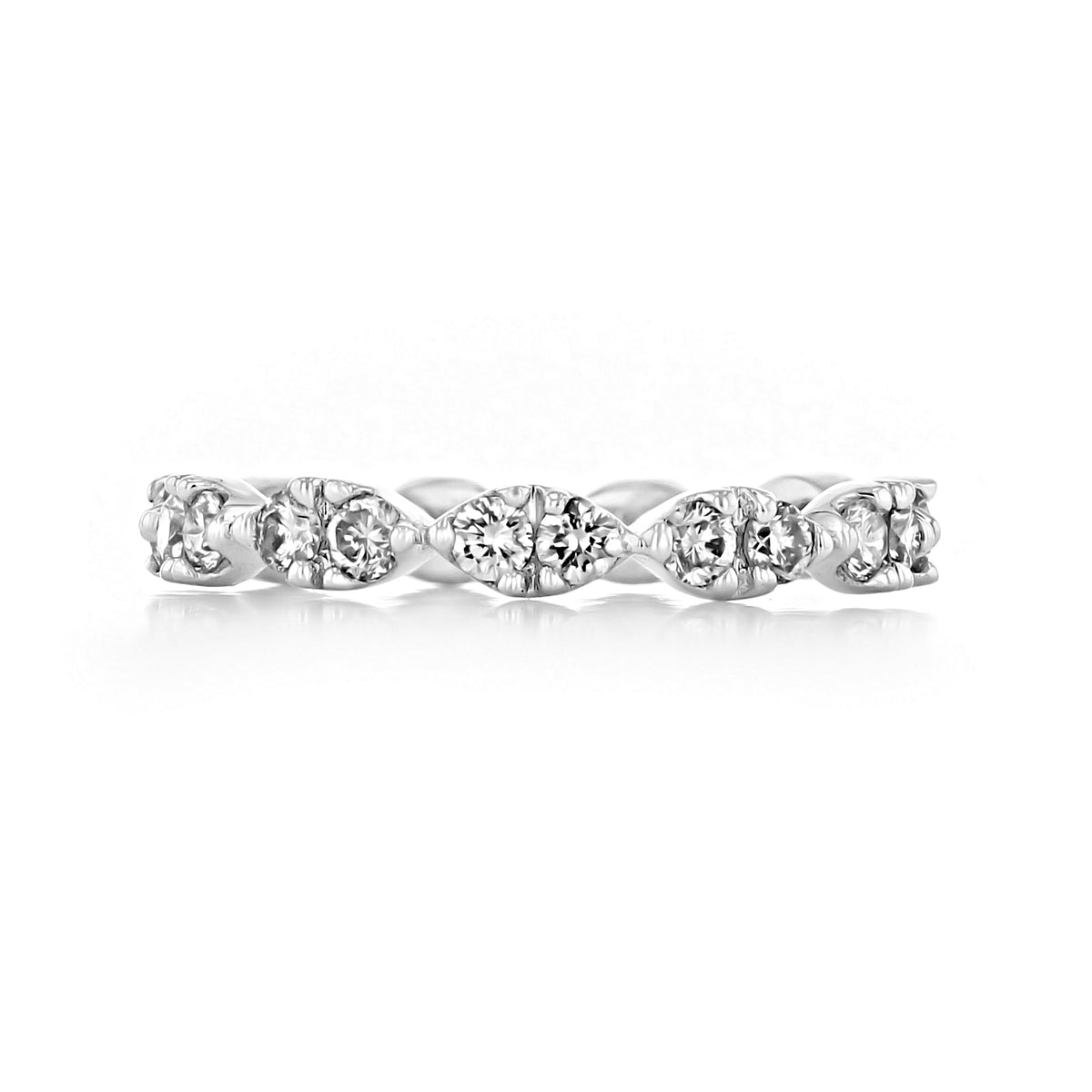 Crescent | Prong-Set Diamond Wedding Band in a silver-toned finish featuring a row of round, prong-set diamonds arranged in a marquise-shaped link pattern.