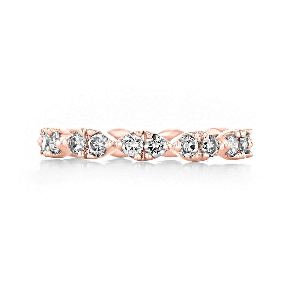 Icing On The Ring Crescent | Prong-Set Diamond Wedding Band in rose gold, featuring a row of shared-prong round diamonds held in a crescent-shaped metal setting.