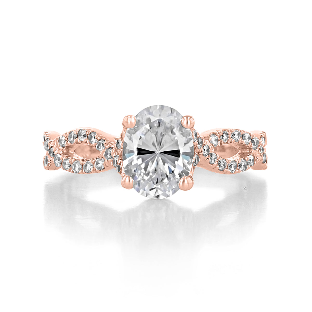 Calista | Oval Twisted Micro-Prong Engagement Ring in rose gold featuring an oval diamond center stone and a twisted band set with micro-prong pavé diamonds.