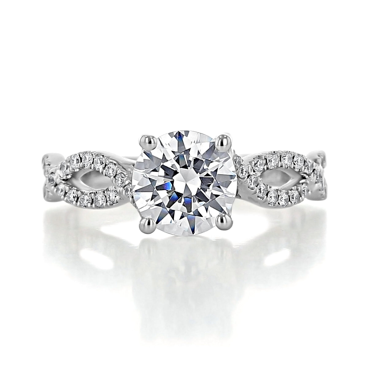 Micro-Prong Engagement Ring MR3-ED featuring a round-cut diamond on a twisted, pavé-set band.