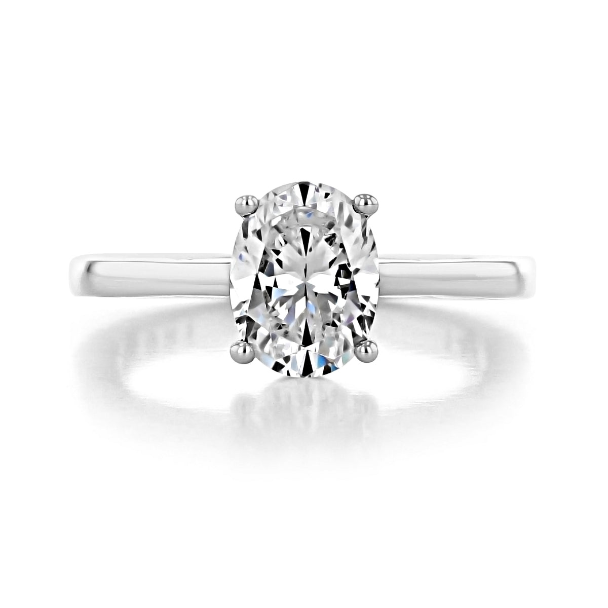 Coastal Crescent | Oval Solitaire Engagement Ring - P100OV85X65W featuring an oval-cut solitaire diamond on a plain white gold band.