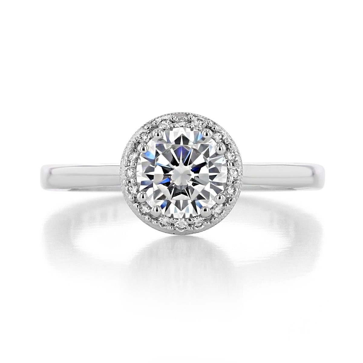 Coastal Crescent | Round Solitaire Engagement Ring - P101RD65W featuring a halo of smaller diamonds on a polished silver band.