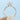 A Tacori Coastal Crescent | Round Solitaire Engagement Ring - P1042RD8W with a round-cut diamond, scalloped metal gallery, and pavé-set diamonds along the band.