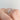 A princess-cut diamond Sculpted Crescent | Princess Solitaire Engagement Ring - 48PR55 by Tacori, featuring a carved crescent detail on the side of the band, worn on a finger.