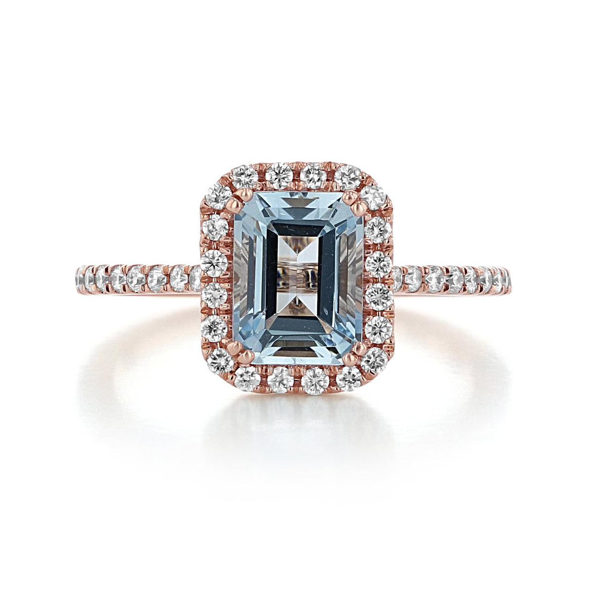 Makur Aquamarine Engagement Ring R1052-4AQ featuring an emerald-cut light blue aquamarine with a diamond halo and diamond-accented band in a rose gold setting.