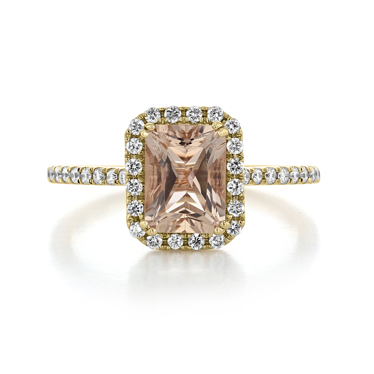 Makur Morganite Engagement Ring | R1052-4 featuring a radiant-cut morganite stone, surrounded by a diamond halo and a diamond-accented yellow gold band.
