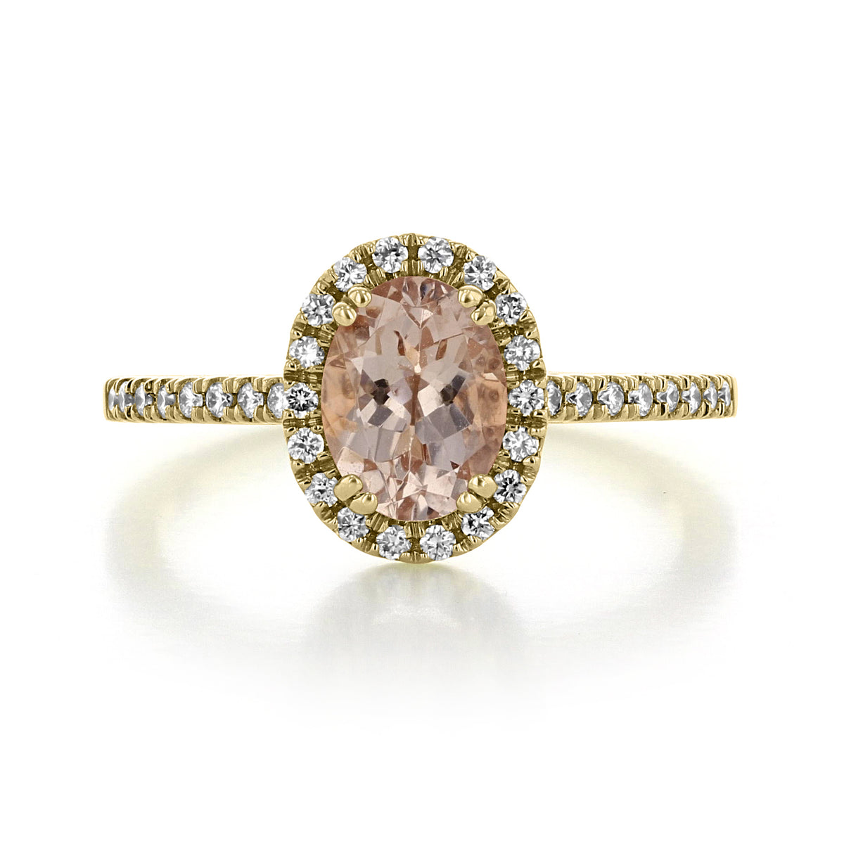Morganite Engagement Ring | R861-4 featuring an oval-cut peach morganite center stone set in a 14k yellow gold band with a diamond halo and pavé-set accents.