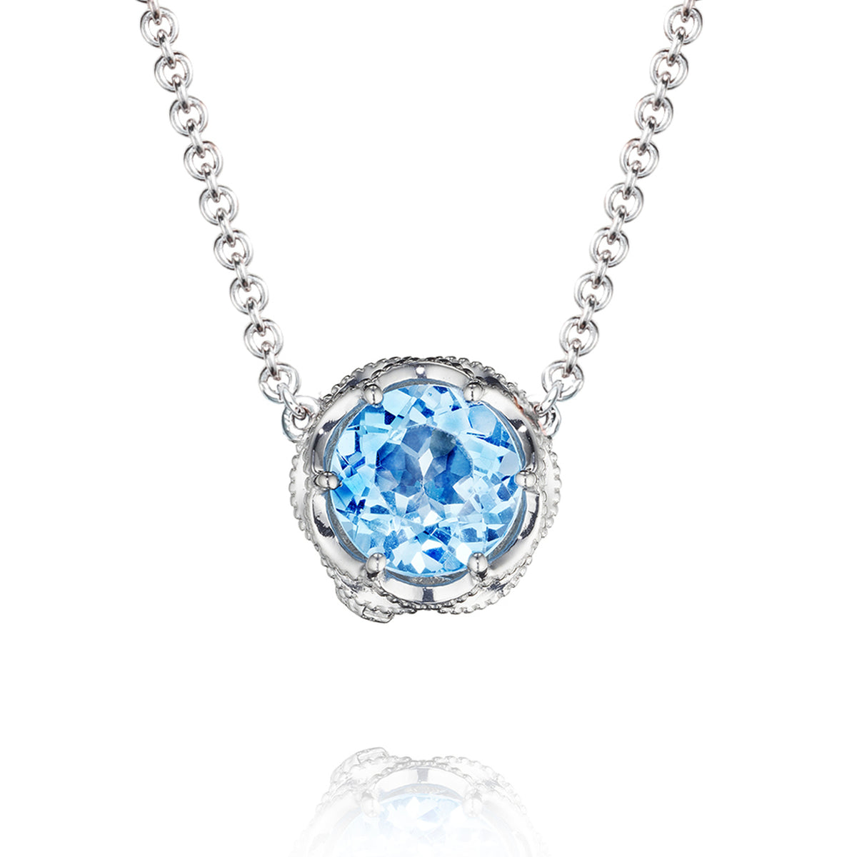 Crescent Crown Swiss Blue Topaz Fashion Necklace featuring a round Swiss Blue Topaz gemstone set in a textured silver basket pendant on a delicate chain.