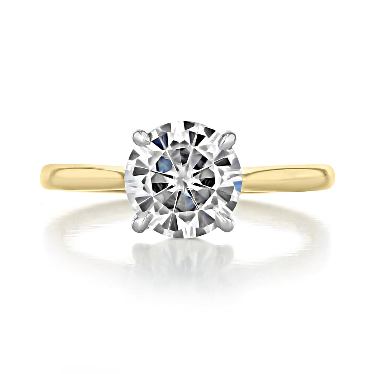 Beverly round solitaire engagement ring featuring a round center diamond, 14k yellow gold band, and silver-toned prongs.