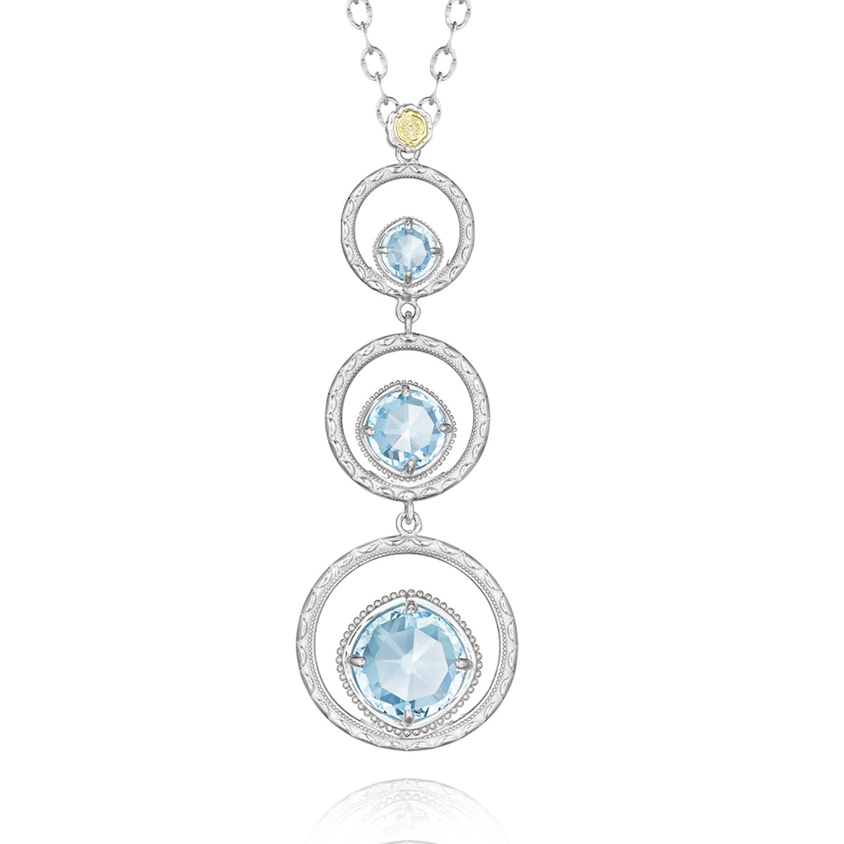 A Gemma Bloom Three-Stone Sky Blue Topaz Fashion Necklace SN14502 featuring three milgrain engraved rings with sky blue topaz stones, suspended from a linked silver chain with a small gold accent at the top.