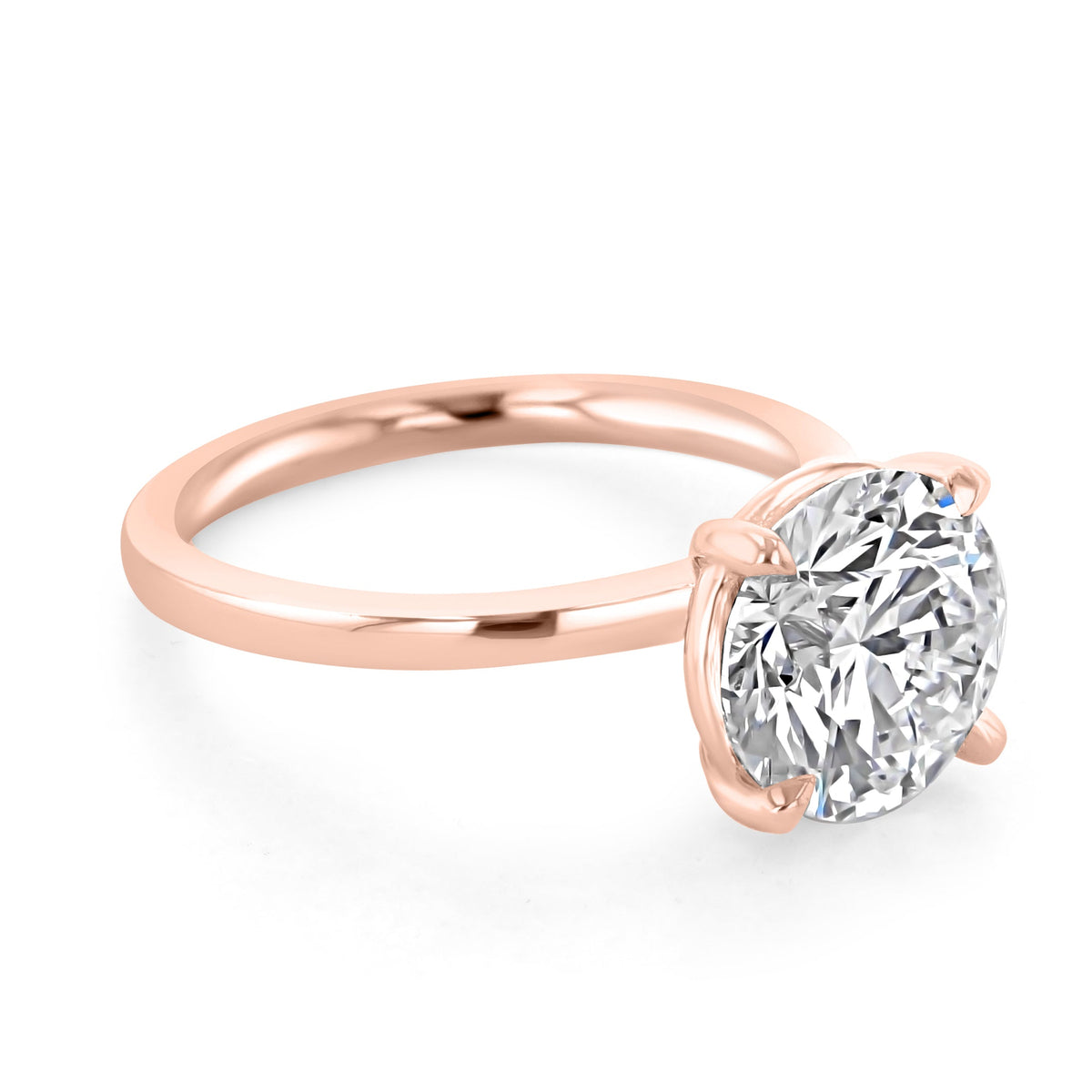 Round solitaire engagement ring in 14k rose gold