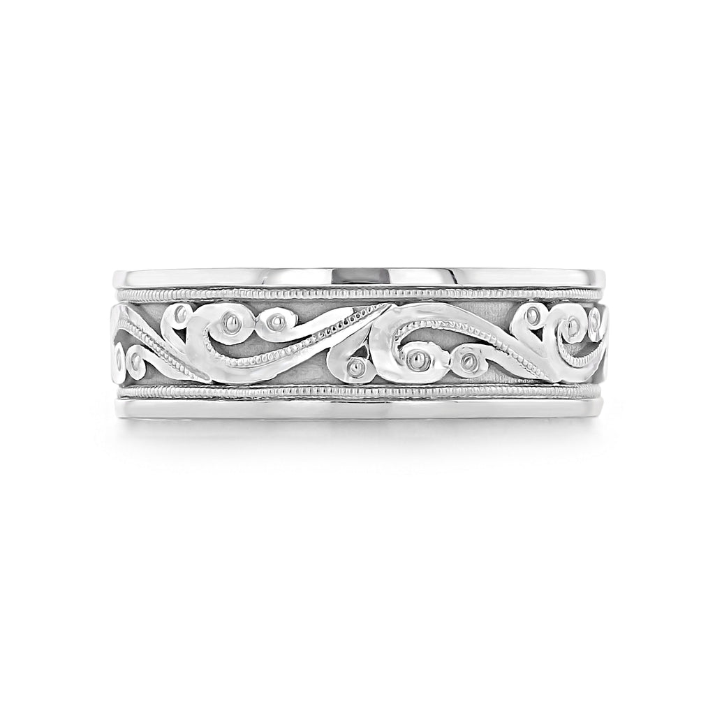 Engraved men's wedding band with a hand-carved scroll pattern and milgrain borders