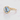 Icing On The Ring Aquamarine Halo Engagement Ring | 2006300 featuring a gold band with a round light blue gemstone, a halo of small white diamonds, and additional diamonds along the band.
