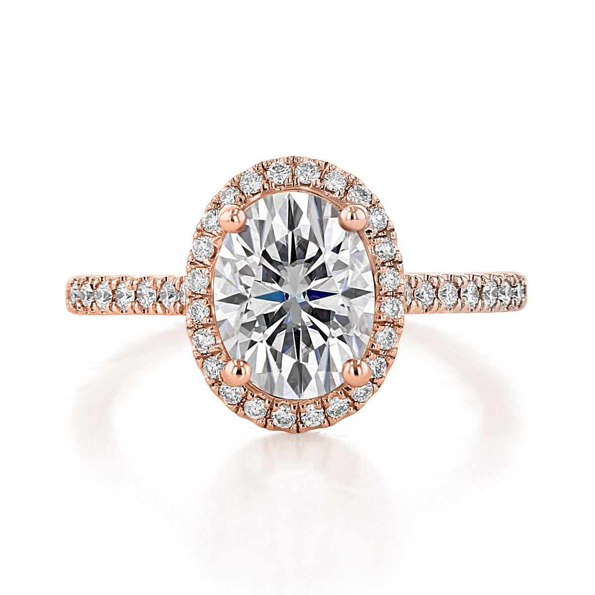 Daphne Oval Halo Engagement Ring featuring an oval-cut diamond with a halo and pavé-set band in a 14k rose gold setting.