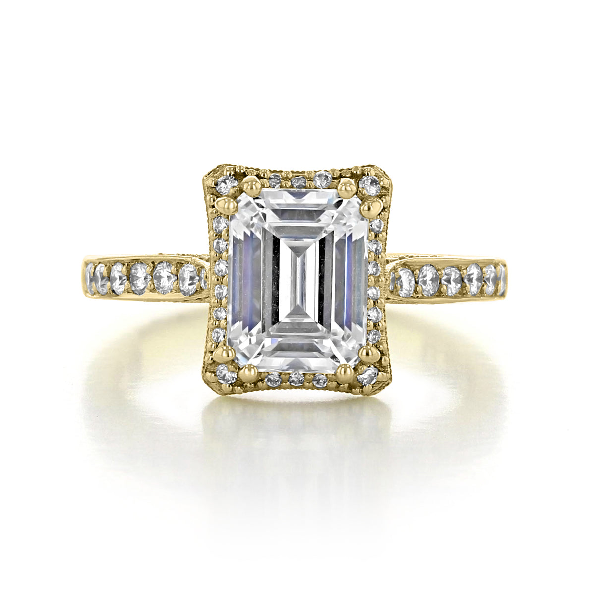 Tacori Dantela | Emerald Bloom Engagement Ring 2620ECMDPY in gold, featuring an emerald-cut center diamond surrounded by a pavé diamond halo and a pavé diamond band.
