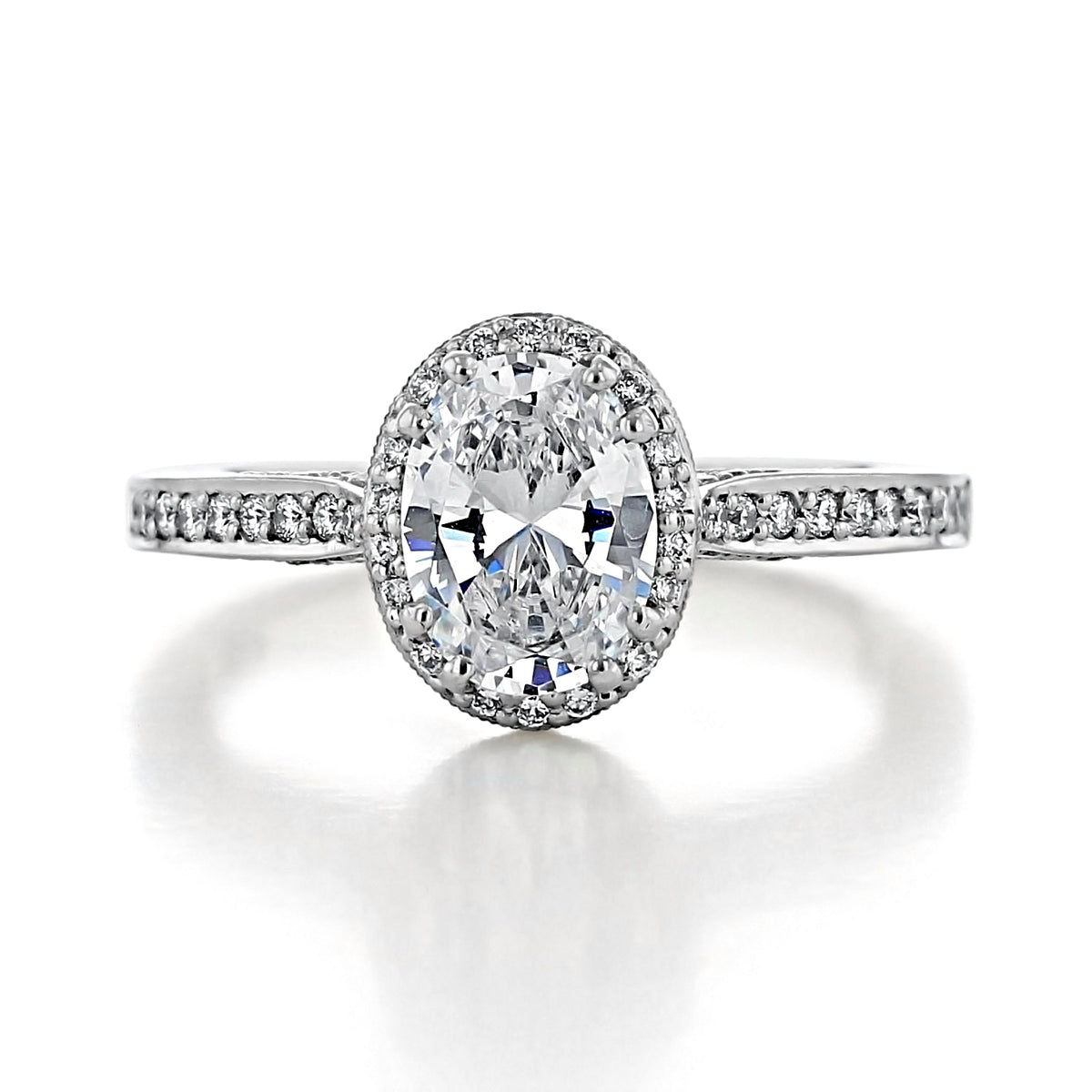 Tacori Dantela | Oval Bloom Engagement Ring - 2620OVMDP featuring an oval-cut diamond with a diamond halo and pavé-set diamonds along the band.