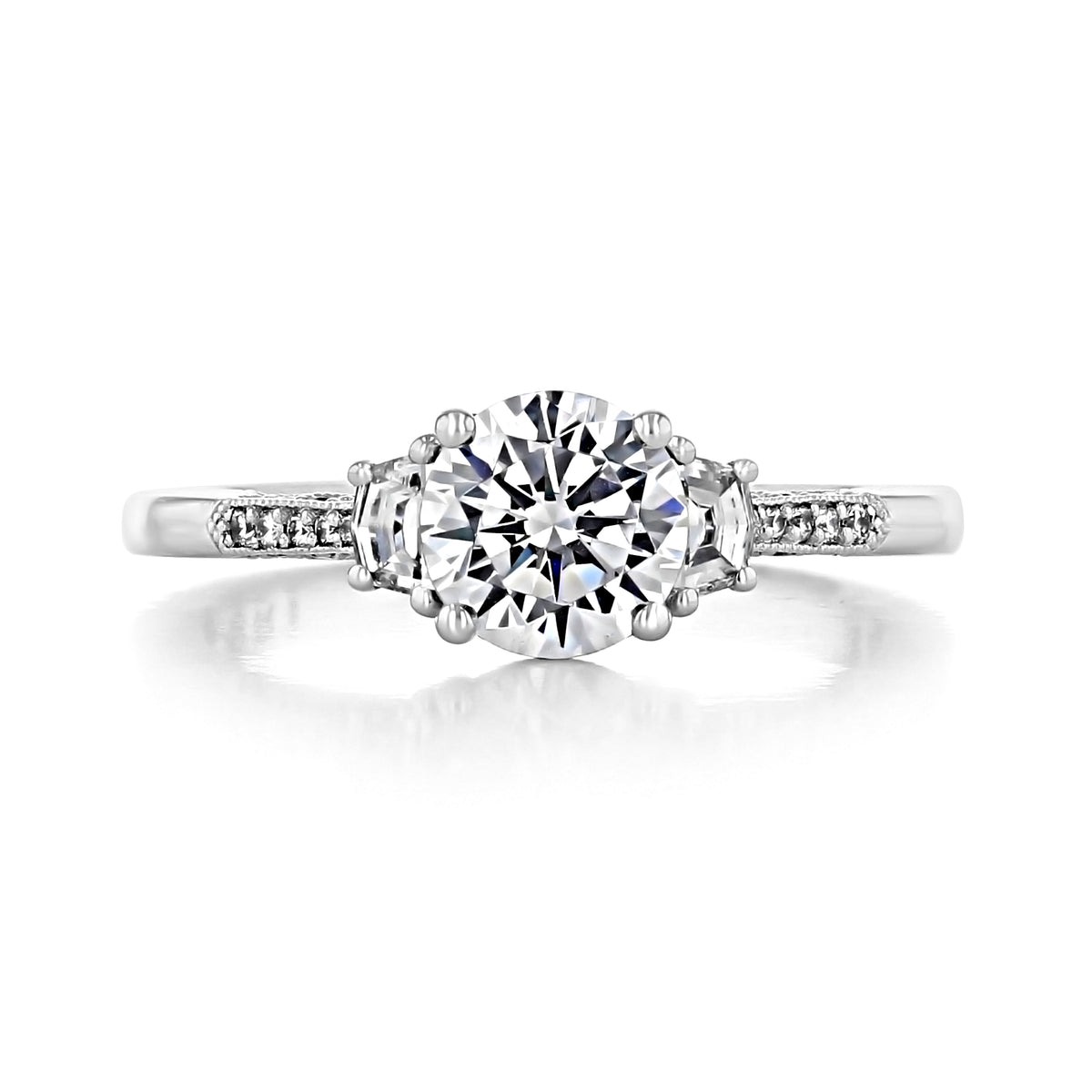 Simply Tacori | Round 3-Stone Engagement Ring - 2659RD65 featuring a round center diamond flanked by two smaller side stones on a pavé diamond band.