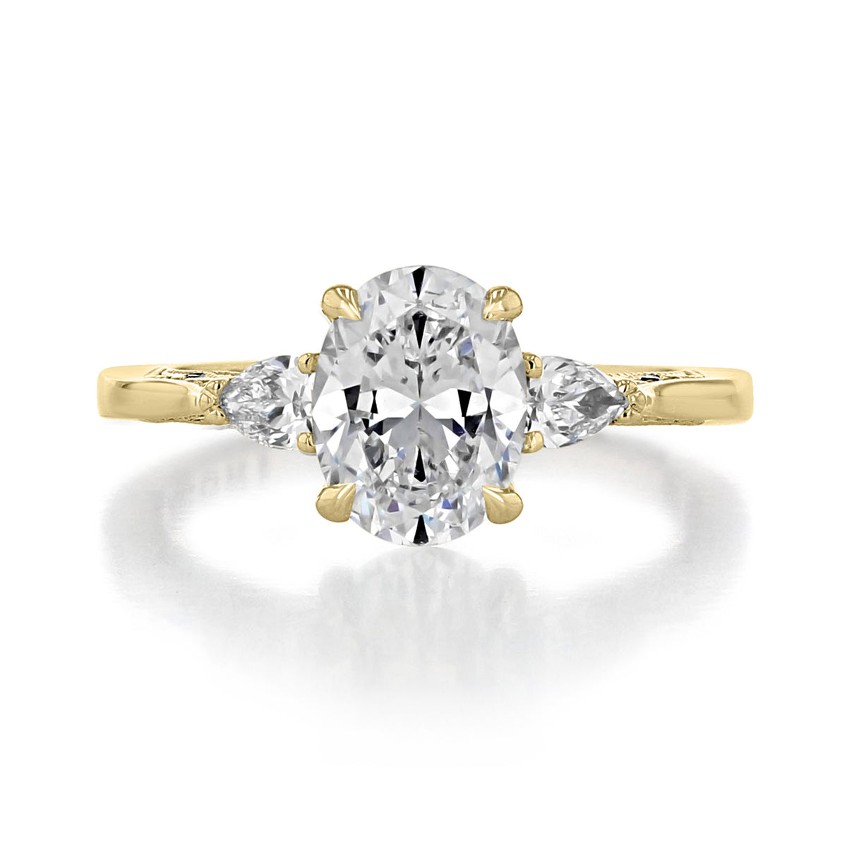 Simply Tacori | Oval 3-Stone Engagement Ring - 2668OV85X65Y featuring a large center oval diamond flanked by two pear-shaped side diamonds on a gold band.