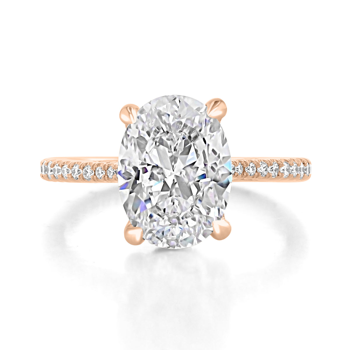 Simply Tacori | Oval Solitaire Engagement Ring - 2671OV115X85PK featuring an oval solitaire diamond on a pavé-embellished rose gold band.