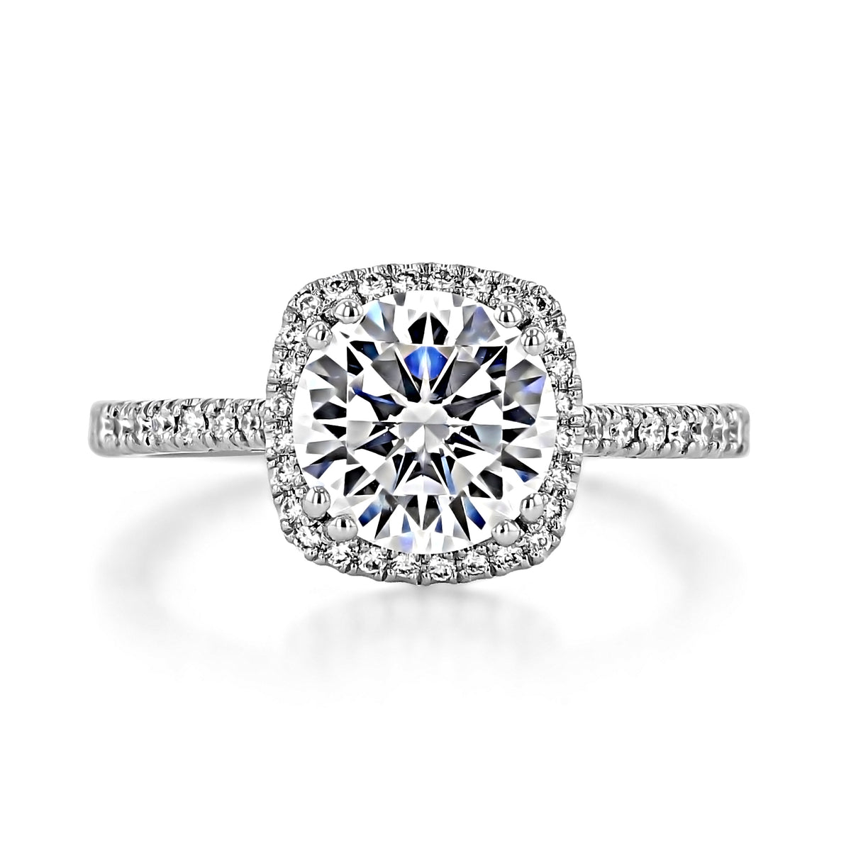 Simply Tacori Round with Cushion Bloom Engagement Ring - 2677CU8 featuring a round center diamond with a cushion-shaped halo and pavé-set diamonds along the platinum cathedral band.