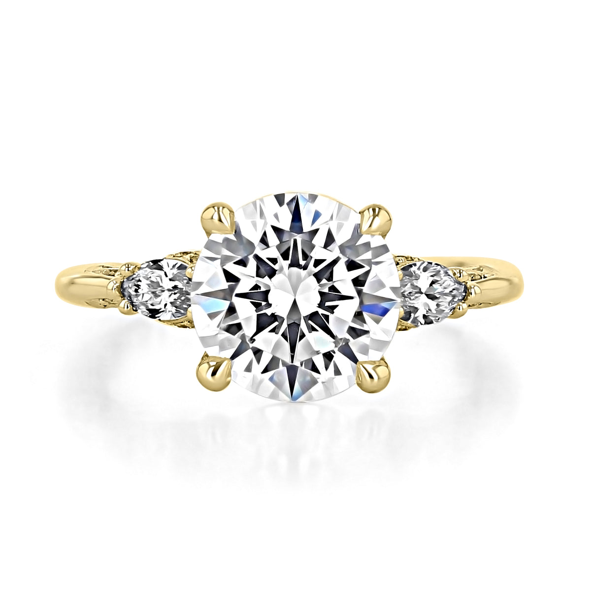 A Simply Tacori | Round 3-Stone Engagement Ring - 2685RD9Y featuring a round center diamond flanked by two smaller pear-shaped diamonds on a yellow gold band.