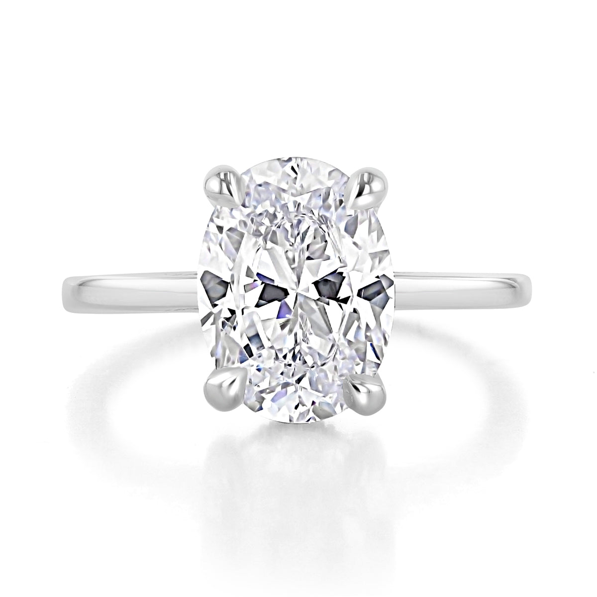 Simply Tacori | Oval Solitaire Engagement Ring - 268815OV115X85W featuring an oval-cut solitaire stone on a plain metal band.
