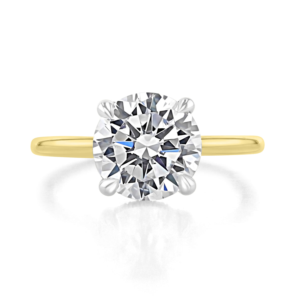 A Simply Tacori Round Solitaire Engagement Ring - 268815RD9YW featuring a round diamond, a yellow gold band, and a white gold four-prong setting.
