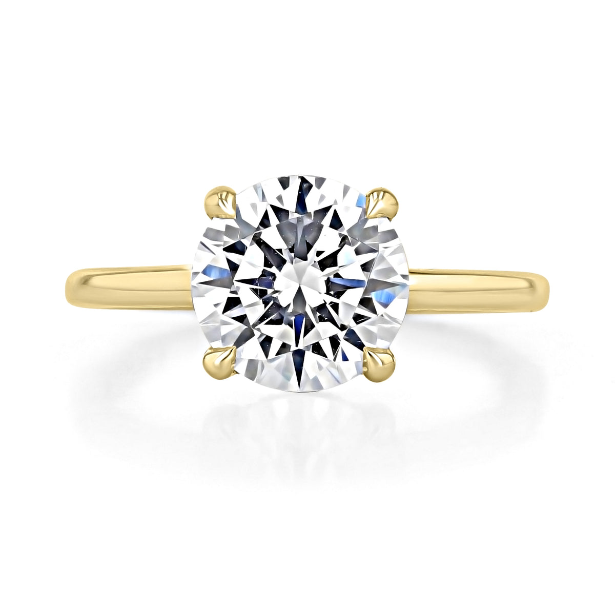 Simply Tacori 268815RD9Y round solitaire engagement ring featuring a round diamond on a yellow gold band with a four-prong setting.