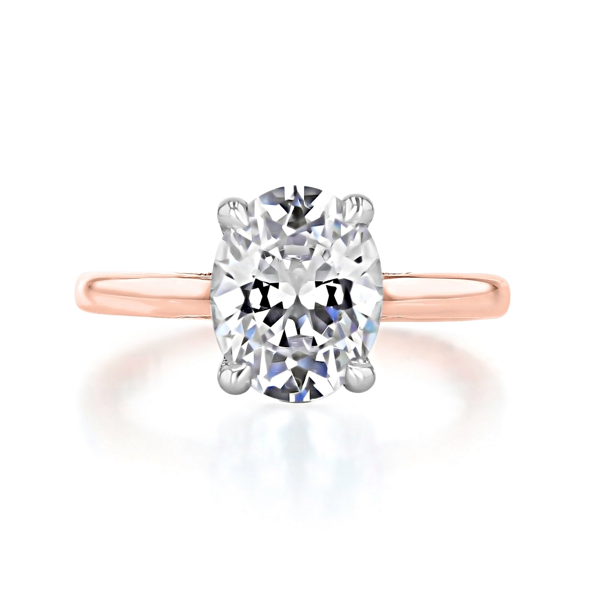 Simply Tacori | Oval Solitaire Engagement Ring - 268822OV10X75WPK featuring an oval-cut solitaire diamond in a four-prong silver setting on a rose gold band.