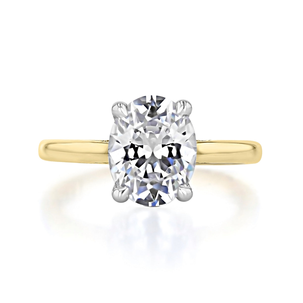 Simply Tacori | Oval Solitaire Engagement Ring - 268822OV10X75WY featuring an oval-cut solitaire diamond on a yellow gold band with white gold prongs.
