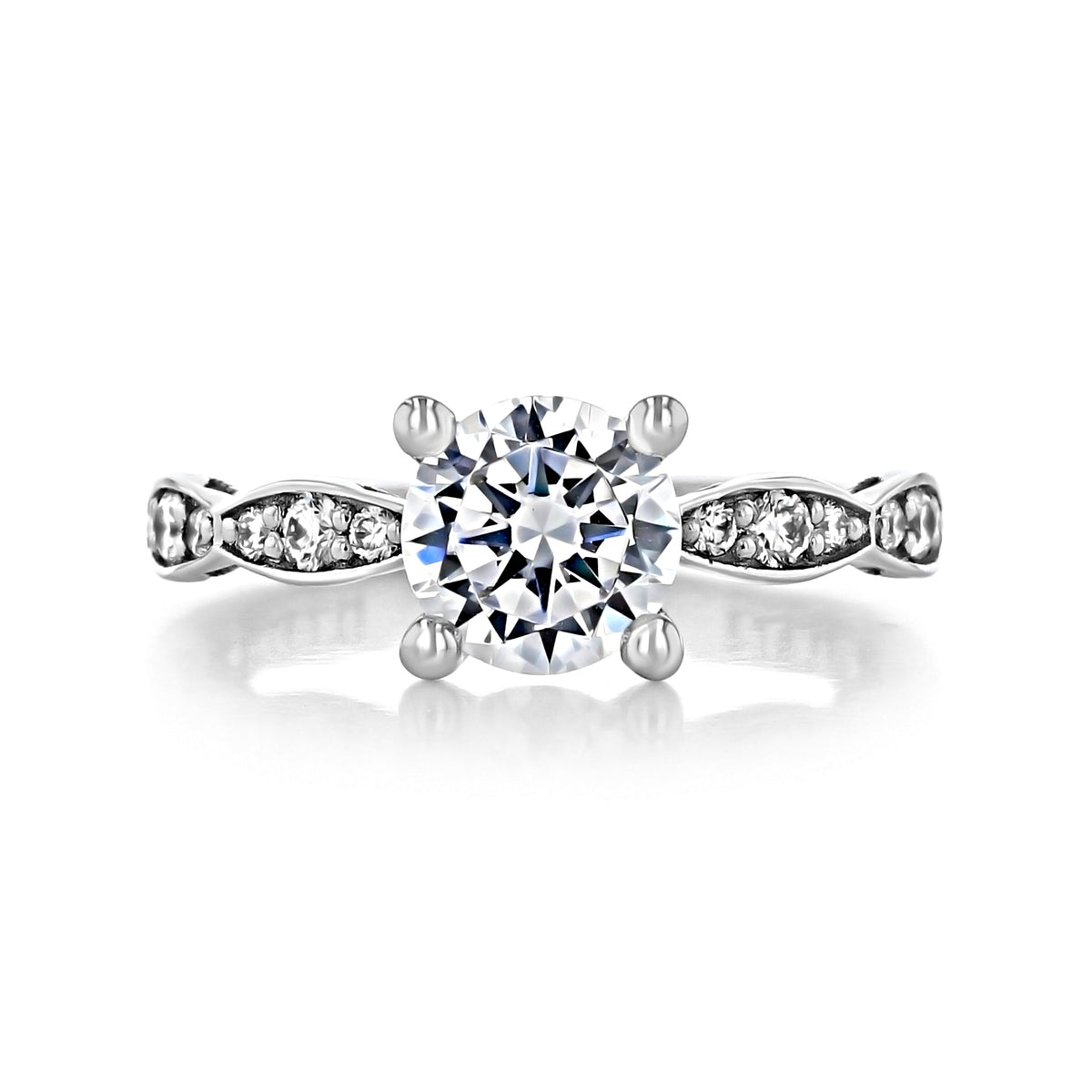 Tacori Sculpted Crescent 46-25RD7 round solitaire engagement ring with a band featuring channel-set accent diamonds.