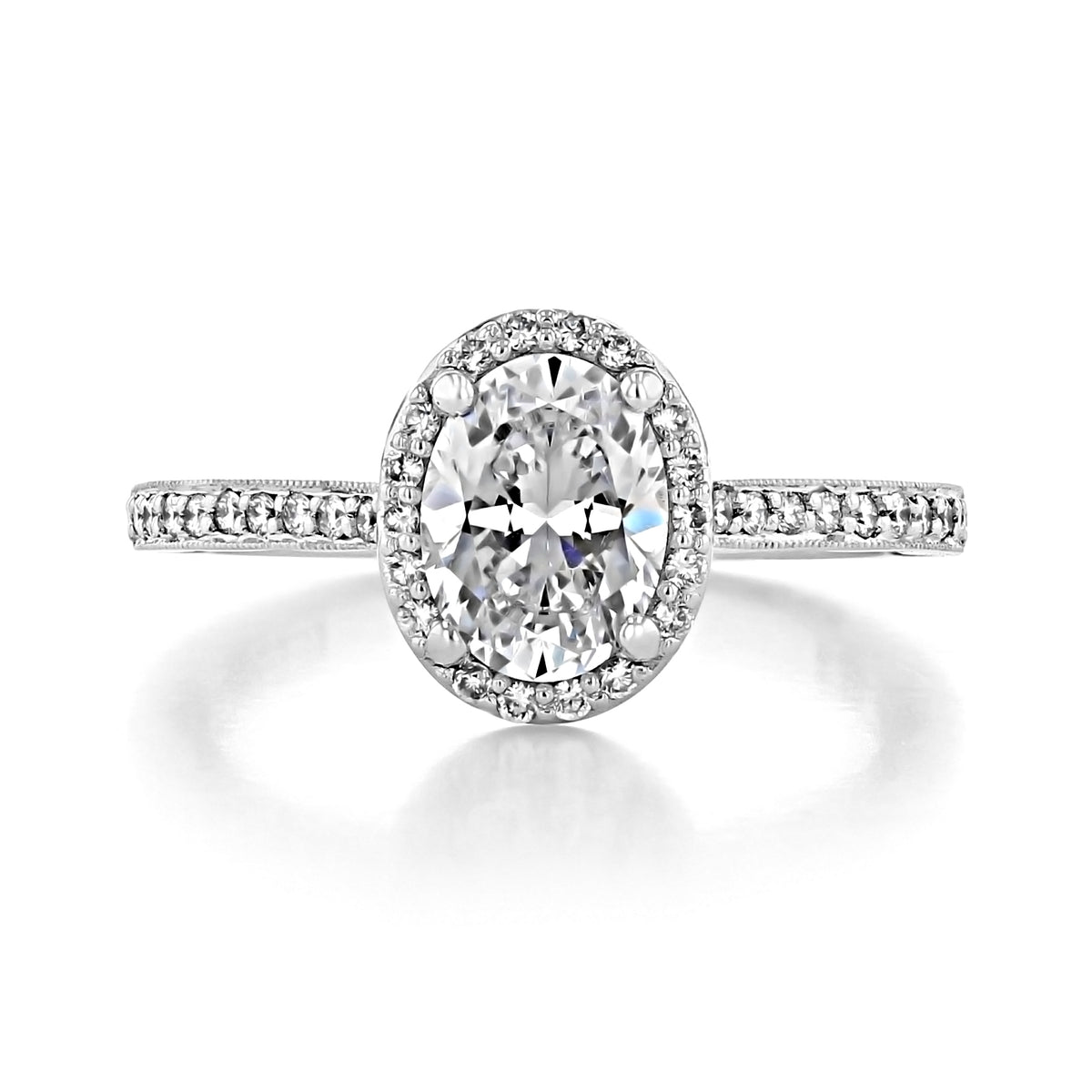 Sculpted Crescent | Oval Solitaire Engagement Ring - 49OVP8X6W featuring an oval diamond solitaire, a pavé halo, and a diamond-accented Tacori band.