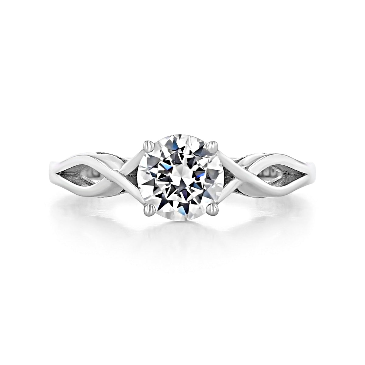 Round solitaire diamond engagement ring on a silver band with the Tacori Sculpted Crescent 51RD65W interlocking design.