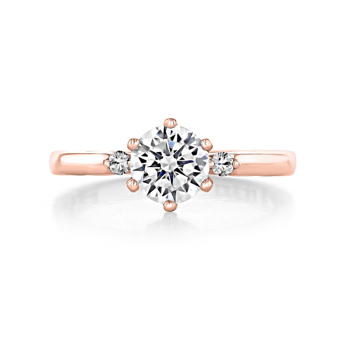 Tacori Sculpted Crescent | Round Pavé Engagement Ring - 56-2RD65PK, a rose gold six-prong ring featuring a large round center diamond flanked by two smaller round diamonds.