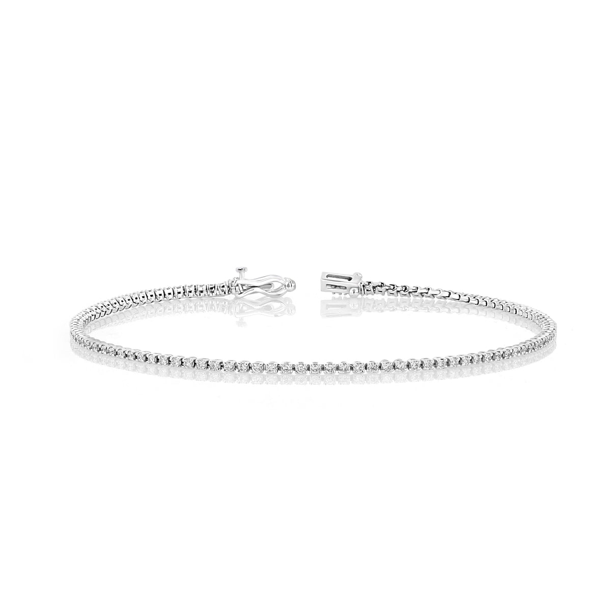 A 0.75 ctw Lab Diamond Tennis Bracelet from Icing On The Ring, featuring a classic elegant silver continuous line of small round diamonds with an open clasp.