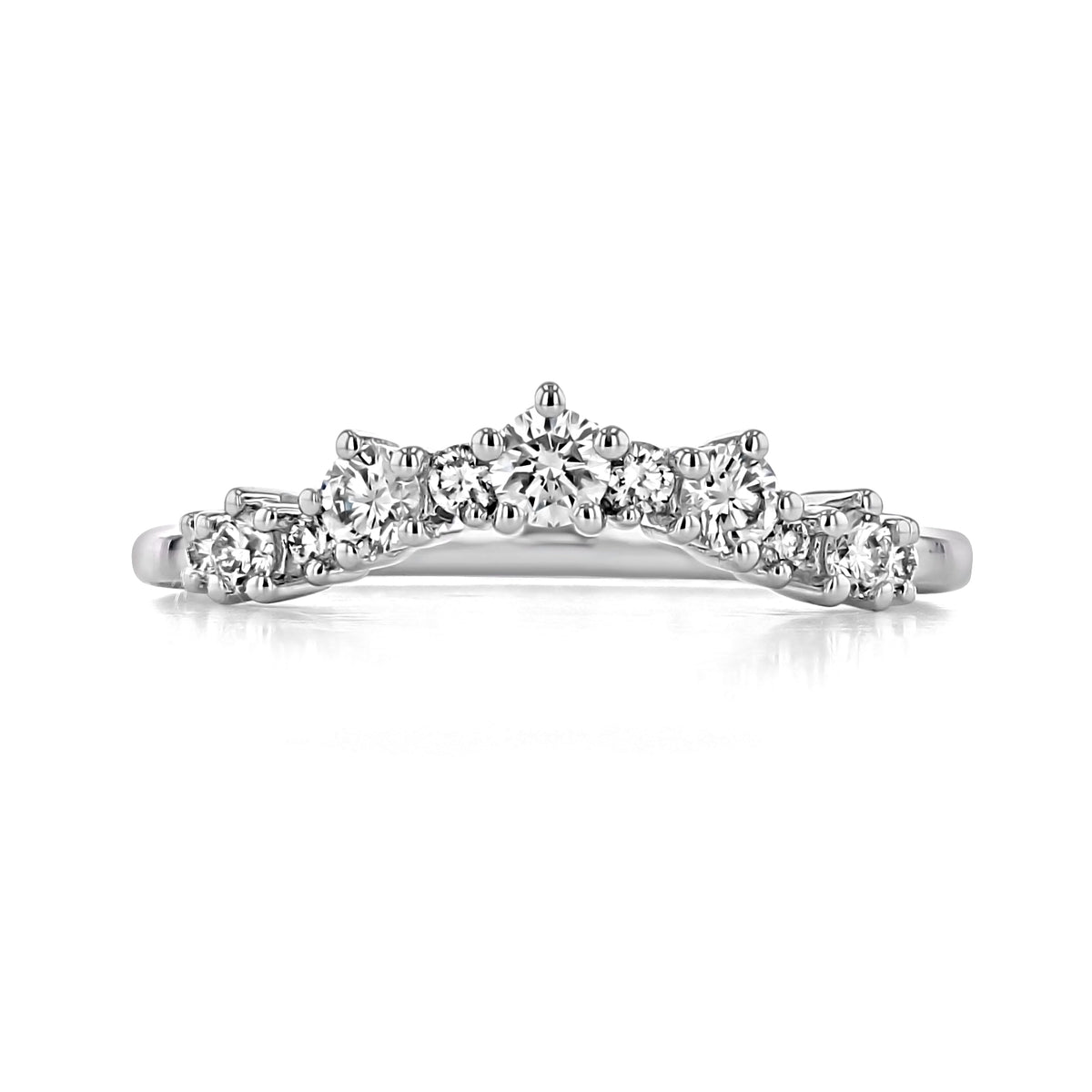 Riviera | Curved Prong-Set Diamond Wedding Band featuring a row of prong-set diamonds in varying sizes.