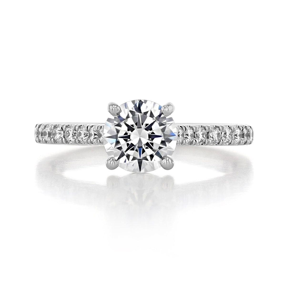 Geneva | Round Micro-Prong Engagement Ring featuring a round diamond with a micro-prong pavé-set band on a white background.