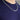 A rhodium plated 5MM Miami Curb Chain | CH5CUW-22 necklace worn around a person’s neck.