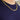 A gold-toned Gold Plated 6MM Miami Curb Chain | CH6FIY-22 necklace worn around a person’s neck, styled as men’s jewelry.