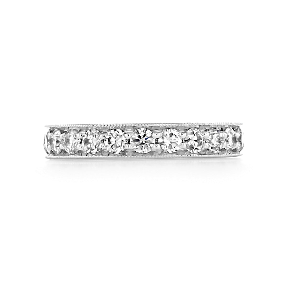 The Sierrah 3.6mm Milgrain Pavé-Set Diamond Wedding Band is a metallic eternity ring featuring a row of pavé-set round diamonds framed by delicate milgrain detailing.