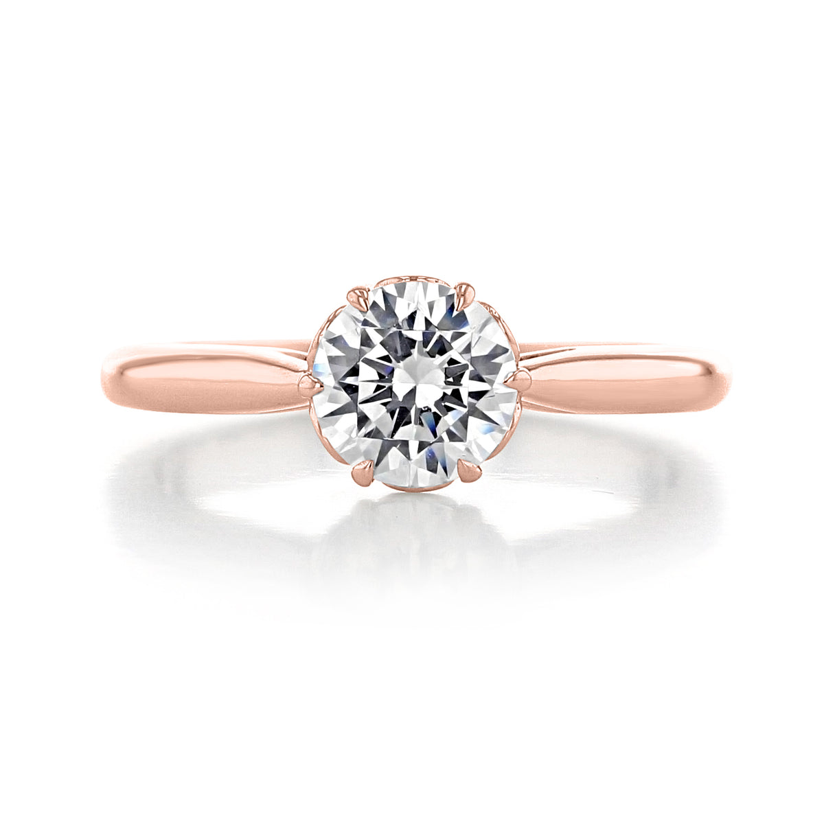 Danhov Classico | 6-Prong Engagement Ring - CL105, featuring a round brilliant-cut diamond solitaire in a six-prong setting on a high-polished rose gold band.