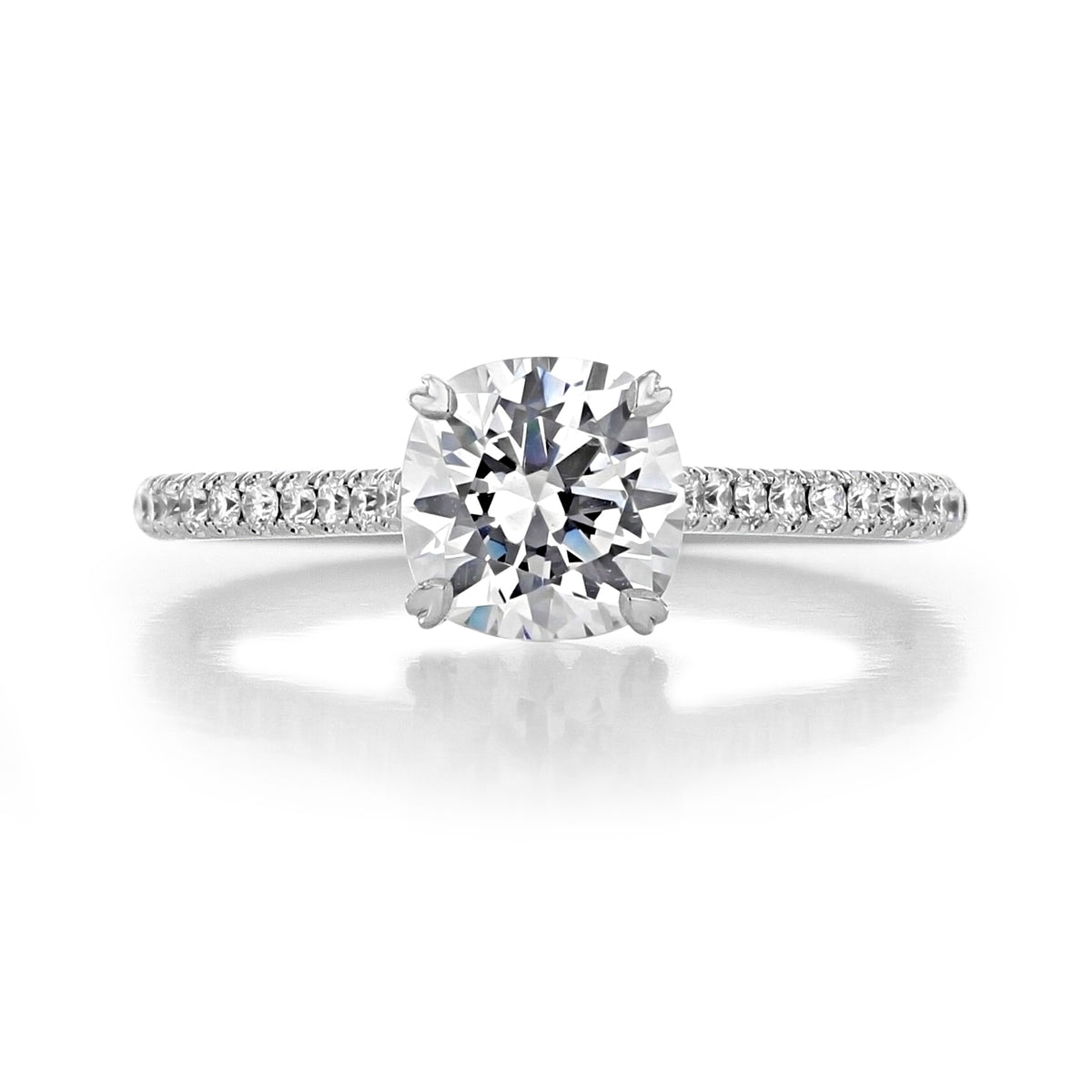 Danhov Classico | Micro-Prong Engagement Ring - CL138 featuring a round-cut center diamond, a pavé band, and a four-prong setting.