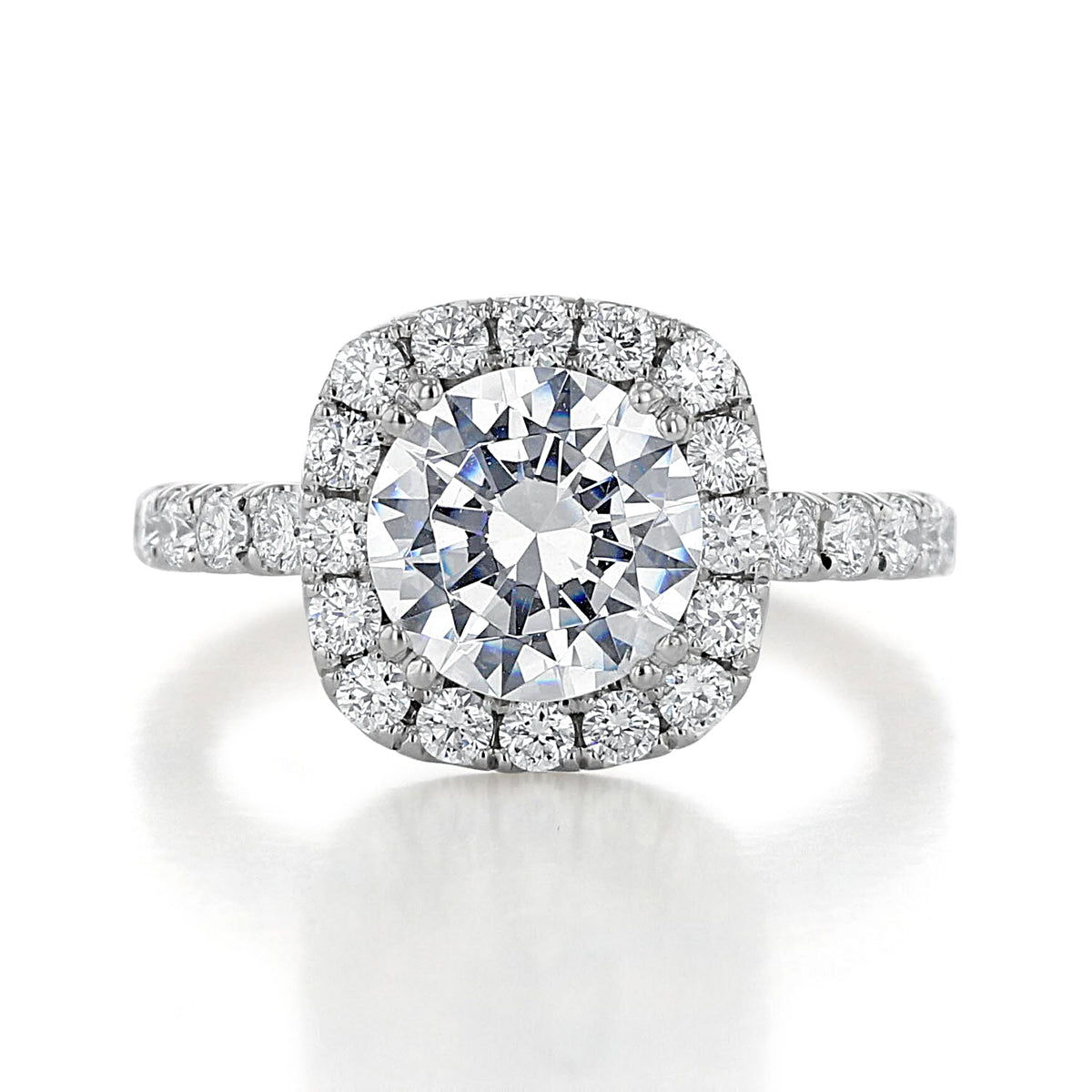 Toluca | Round Large Halo Engagement Ring featuring a round brilliant-cut diamond, a square halo, and micro-prong diamonds set along the band.