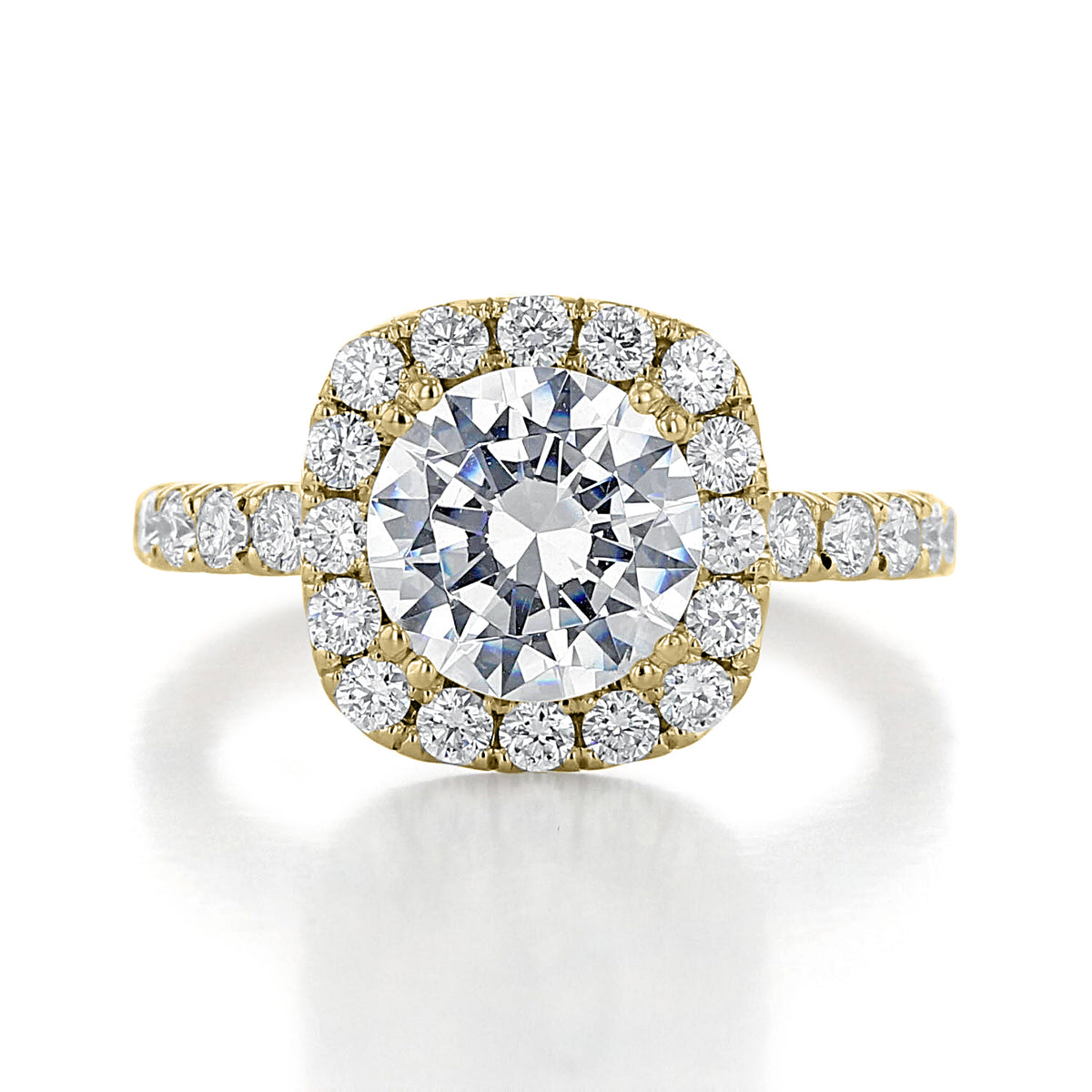 Toluca | Round Large Halo Engagement Ring featuring a center diamond surrounded by a halo of smaller stones, with micro-prong diamonds set along the band.