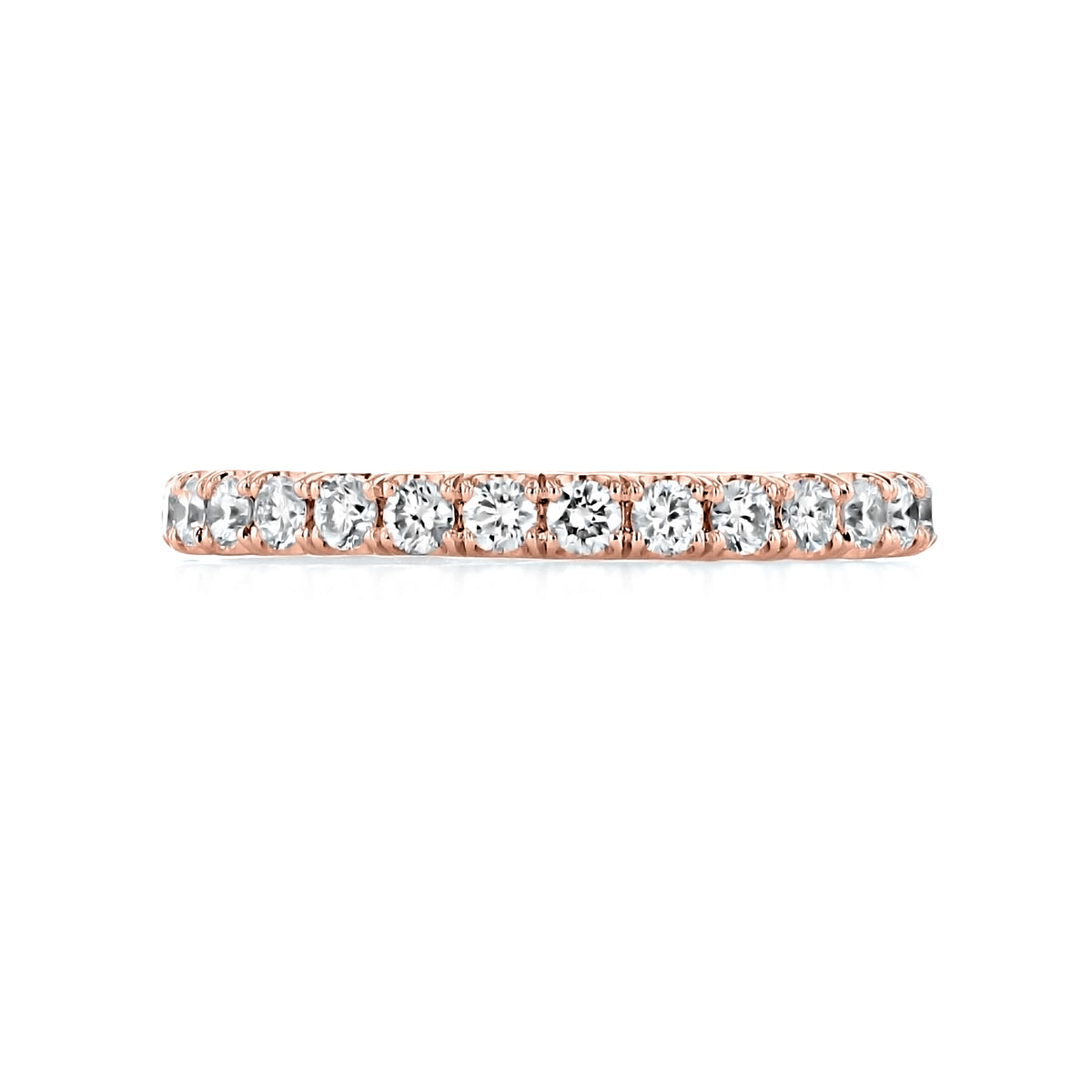 Salinas Micro-Prong Diamond Wedding Band by Icing On The Ring, a 14k rose gold eternity band set with a row of round brilliant-cut diamonds held by micro-prongs.
