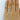 A thin platinum Salinas | Micro-Prong Diamond Wedding Band by Icing On The Ring, featuring a single row of round diamonds, worn on a finger.