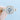 Vienna Round Halo Engagement Ring featuring a round brilliant-cut center diamond in a square halo setting with side accents on a silver-toned band.