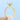 Kiara | Oval Hidden Halo Engagement Ring featuring an oval diamond with a diamond-studded hidden halo and pavé band in a gold setting.